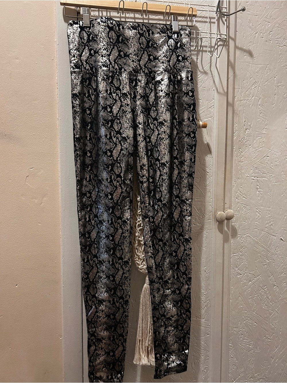 Bundle of three leggings black, silver bake print and dark blue size small.